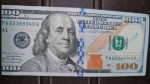 انخفاض سعر صرف الدولار في السوق الموازي إلى 7400